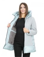 Piumino celeste 52 con stoffa sul davanti e sulle maniche lunghe cappuccio zip